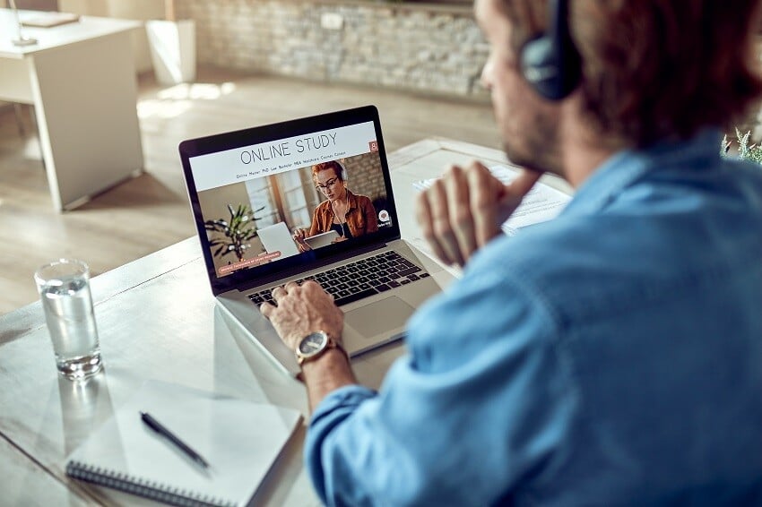 unrecognizable-man-choosing-online-study-program-w-2022-10-03-23-41-52-utc